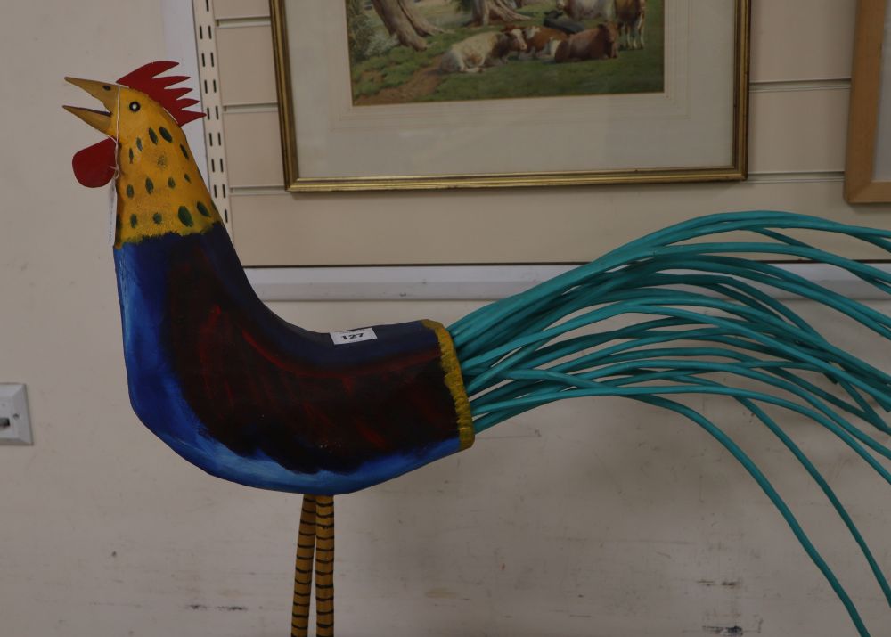 A painted wood model of a cockerel by WD Roach 1992, length 86cm approx.